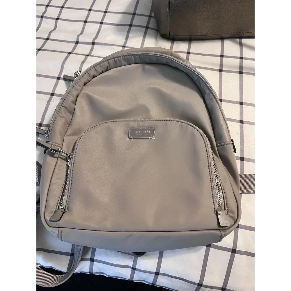 Kate Spade New York Dawn Medium Backpack Soft Taupe Gray w/ Front Pocket
